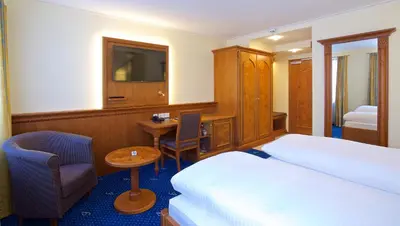 Ein Bett oder Betten in einem Zimmer der Unterkunft Hotel am Schloßberg