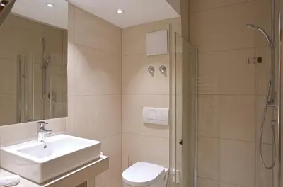 Ein Badezimmer in der Unterkunft Hotel am Schloßberg