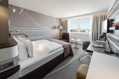 Ein Bett oder Betten in einem Zimmer der Unterkunft Holiday Inn Munich City Centre by IHG
