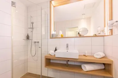 Ein Badezimmer in der Unterkunft Boutique Hotel Atrium München