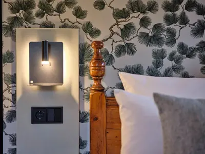 Ein Bett oder Betten in einem Zimmer der Unterkunft Classik Hotel Martinshof, Messe München