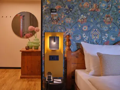 Ein Bett oder Betten in einem Zimmer der Unterkunft Classik Hotel Martinshof, Messe München