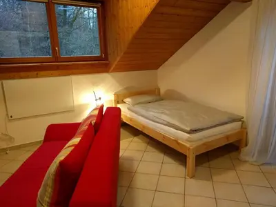 Ein Bett oder Betten in einem Zimmer der Unterkunft Komfortabel wohnen am Waldrand von Pitzling