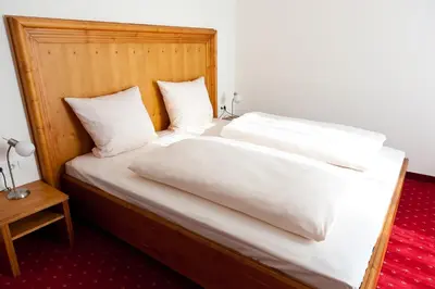 Ein Bett oder Betten in einem Zimmer der Unterkunft Langwieder See