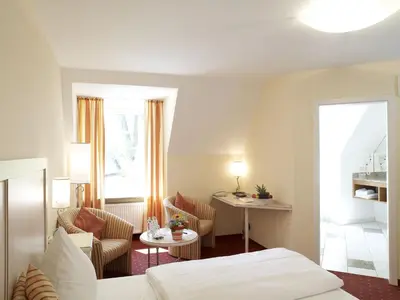 Ein Bett oder Betten in einem Zimmer der Unterkunft Langwieder See