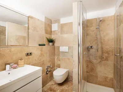 Ein Badezimmer in der Unterkunft Die Suttenhütte
