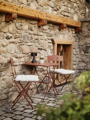 Ein Patio oder anderer Außenbereich in der Unterkunft Die Suttenhütte