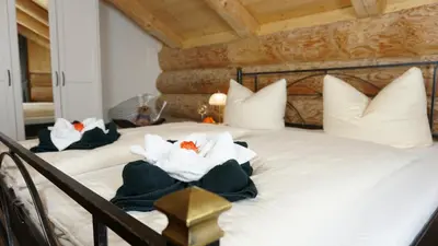 Ein Bett oder Betten in einem Zimmer der Unterkunft LakeStarnberg