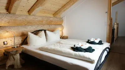 Ein Bett oder Betten in einem Zimmer der Unterkunft LakeStarnberg