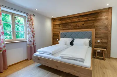 Ein Bett oder Betten in einem Zimmer der Unterkunft Alpinum Junior