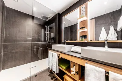 Ein Badezimmer in der Unterkunft Das Bayrischzell Familotel Oberbayern