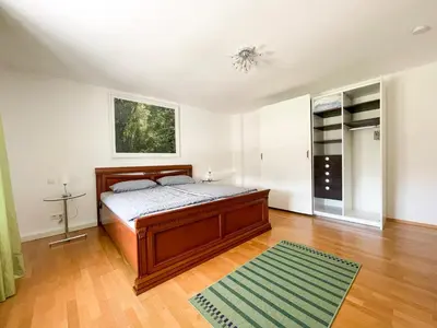 Ein Bett oder Betten in einem Zimmer der Unterkunft Fewo Isarblick Bad Tölz