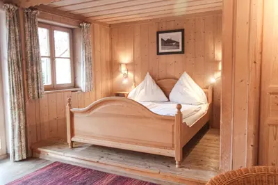Ein Bett oder Betten in einem Zimmer der Unterkunft Appartementhaus Schirsner - direkt am See & am Kurpark