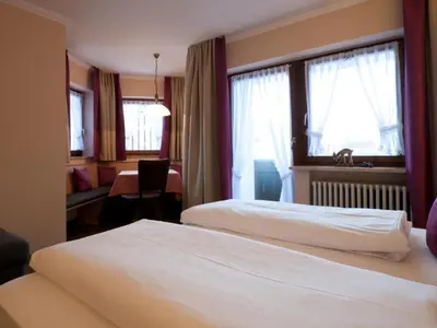 Ein Bett oder Betten in einem Zimmer der Unterkunft Hotel-Gasthof Sperrer