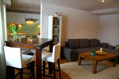 Ein Sitzbereich in der Unterkunft Ferienwohnung Thann