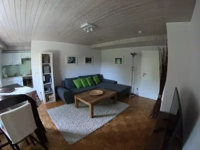 Ein Sitzbereich in der Unterkunft Ferienwohnung Thann