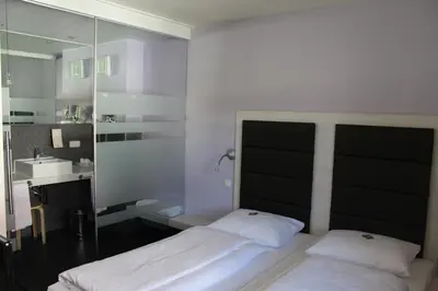 Ein Bett oder Betten in einem Zimmer der Unterkunft Amiga Hotel München Messe