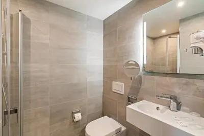 Ein Badezimmer in der Unterkunft Hotel Amper