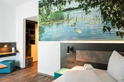 Ein Bett oder Betten in einem Zimmer der Unterkunft Hotel Amper