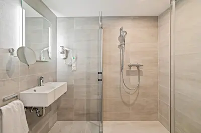 Ein Badezimmer in der Unterkunft Hotel Amper