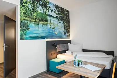 Ein Bett oder Betten in einem Zimmer der Unterkunft Hotel Amper