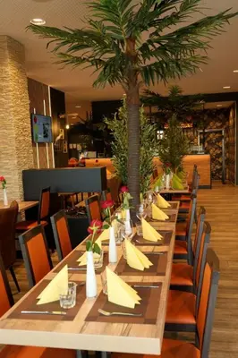 Ein Restaurant oder anderes Speiselokal in der Unterkunft Hotel Amper