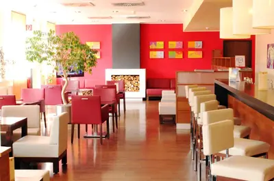 Ein Sitzbereich in der Unterkunft Star G Hotel München Schwabing