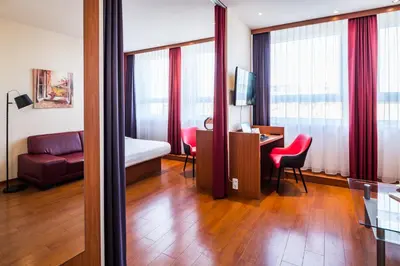Ein Sitzbereich in der Unterkunft Star G Hotel München Schwabing
