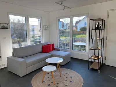 Ein Sitzbereich in der Unterkunft Ferienwohnung Vöst