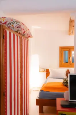 Ein Bett oder Betten in einem Zimmer der Unterkunft Ferienwohnung in der Kirchgasse
