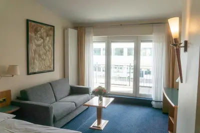 Ein Sitzbereich in der Unterkunft Hotel Daniel