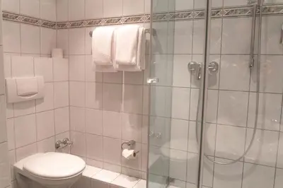 Ein Badezimmer in der Unterkunft Hotel Daniel