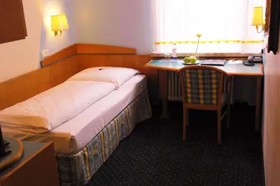 Ein Bett oder Betten in einem Zimmer der Unterkunft Hotel Daniel