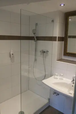Ein Badezimmer in der Unterkunft Hotel Daniel