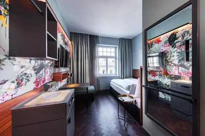 Ein Bett oder Betten in einem Zimmer der Unterkunft Maison Schiller by DesignCity Hotels