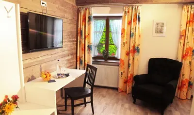Ein Sitzbereich in der Unterkunft Pension Kranzmayr