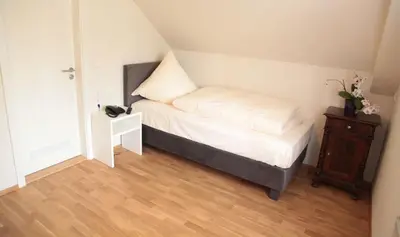 Ein Bett oder Betten in einem Zimmer der Unterkunft Pension Kranzmayr