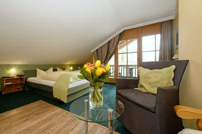 Ein Bett oder Betten in einem Zimmer der Unterkunft Hotel zum Maximilian