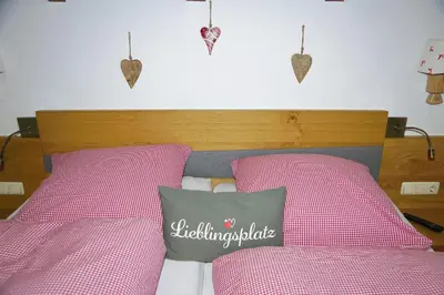 Ein Bett oder Betten in einem Zimmer der Unterkunft Ferienwohnung Johannesklause