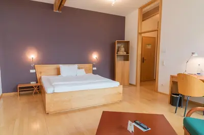 Ein Bett oder Betten in einem Zimmer der Unterkunft Das Schandl