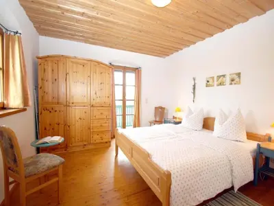 Ein Bett oder Betten in einem Zimmer der Unterkunft Kirmeier Hof