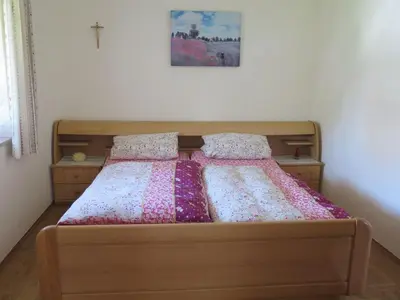 Ein Bett oder Betten in einem Zimmer der Unterkunft Ferienwohnung Aiblinger