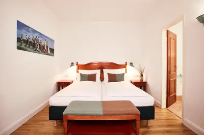 Ein Bett oder Betten in einem Zimmer der Unterkunft Hotel Prinzregent München Messe