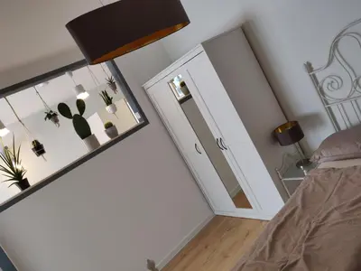Ein Bett oder Betten in einem Zimmer der Unterkunft Chiemsee Apartments