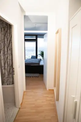 Ein Bett oder Betten in einem Zimmer der Unterkunft Tolles Apartment mit Weitblick über Augsburg