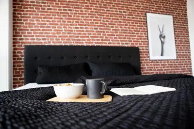 Ein Bett oder Betten in einem Zimmer der Unterkunft Tolles Apartment mit Weitblick über Augsburg