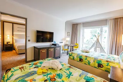 Ein Bett oder Betten in einem Zimmer der Unterkunft Hilton Munich City