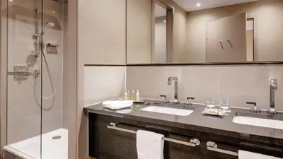 Ein Badezimmer in der Unterkunft Hilton Munich City