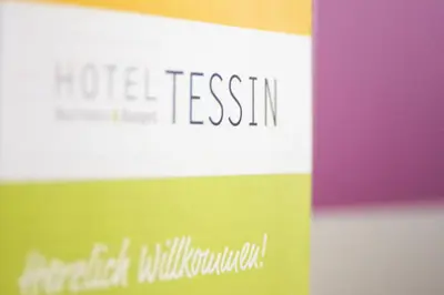 Ein Zertifikat, Auszeichnung, Logo oder anderes Dokument, das in der Unterkunft Business & Budget Hotel Tessin ausgestellt ist