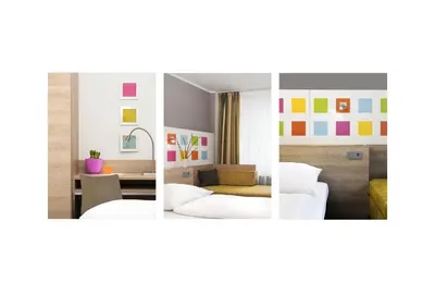 Ein Bett oder Betten in einem Zimmer der Unterkunft Business & Budget Hotel Tessin